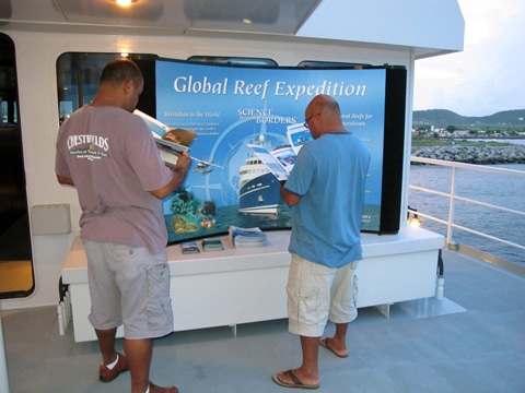 Fishermen take a moment to read about the Foundation’s and TNC's research