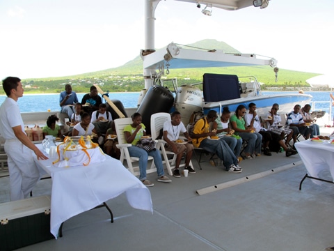 Students enjoying the BBQ on the Shadow's aft deck