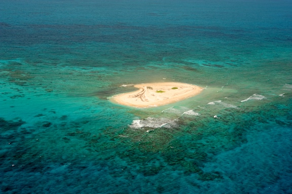 Southeast Cay, a sand spit located on the reef rim of Hogsty Reef, Bahamas