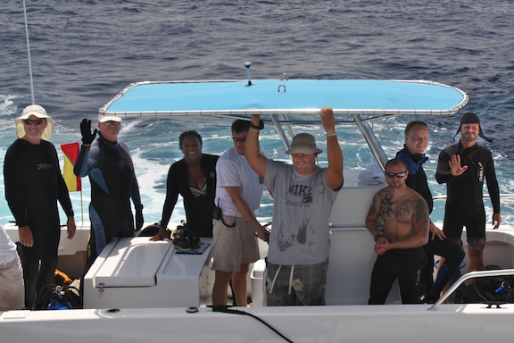 Research divers head out for the first fish, coral, and coral disease surveys of the Inaguas Global Reef Expedition