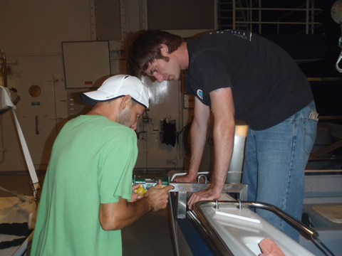 Jeremy Kerr (right) and Anesti Stathakopoulos (left) are preparing the ground truthing gear.