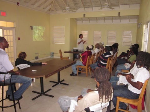 Dr. Bruckner discusses the Jamaica mission with members of the fishing community.