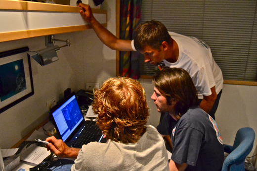 Going through satellite and survey data looking for dive sites (l to r: Andy Bruckner, Jeremey Kerr, and Brian Beck)