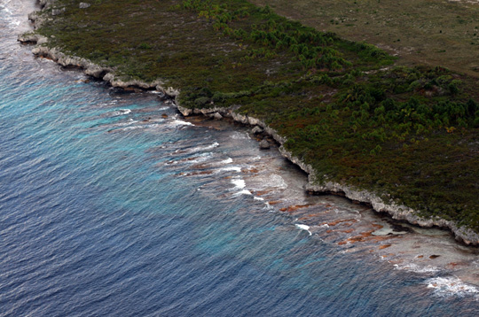 Example of uplifted cliffs at one end of Niau
