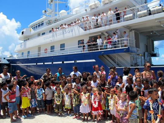 Group photo with all of the students, researchers, and officers and crew of the Golden Shadow as part of the Fakarava Outreach.