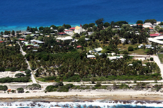 Aerial view of one of the two main villages on Rangiroa, Tiputu