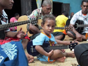 Young Fijian boy practicing with the vakatara.