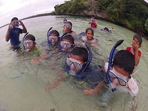 Unique Outdoor Education Opportunity: GPS Matamaka students getting ready to snorkel in order to observe what is happening at the coral nursery.