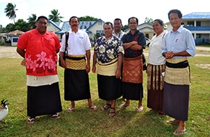 Here the men are wearing traditional mats.