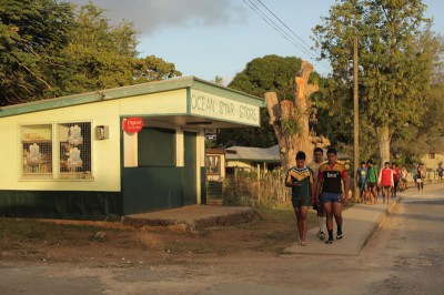 Rugby players make their way home after practice in Vava'u, Tonga.