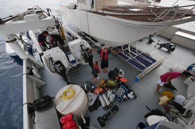 Catlin Seaview Survey team preparing their gear on the deck of the Golden Shadow.