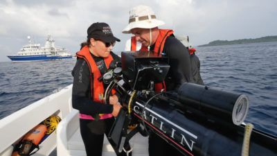 Catlin Seaview Survey team preparing SV-II panoramic camera for deployment.