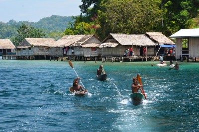 kia-village-boys-canoeing-after-the-boat-1