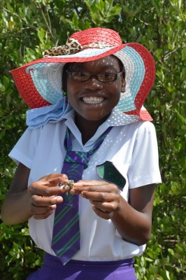 This student was so excited to hold a crab for the first time. 