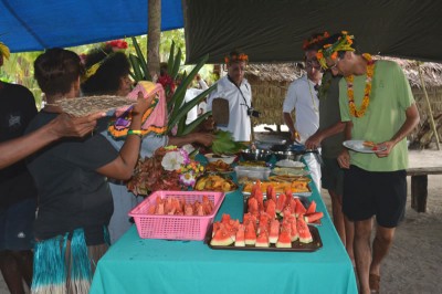 Ocean scientists enjoy local cuisine of Mola'a, Solomon Islands.