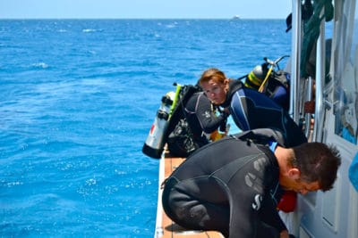 Alex Dempsey, getting ready to explore the lagoon, with the Golden Shadow in the background