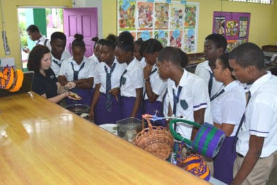Jamaican high school students enthralled by sea stars.