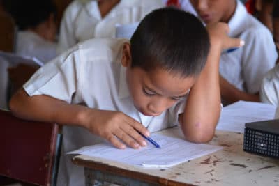 Tongan primary school students taking coral reef education survey