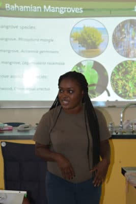 Cassandra Abraham teaching students about the types of Bahamian mangroves.